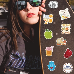 Autocollants de Rosh Hashanah avec motifs pomme et miel sur un skateboard tendance