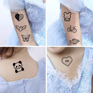 Waterproof cartoon temporary tattoos with heart, bear, and butterfly patterns for kids