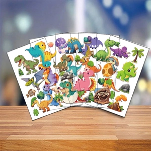 Detailed view of colorful cartoon dinosaur temporary tattoos stickers for kids' parties