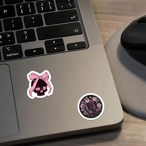 500pcs Goth aesthetic black pink stickers on laptop featuring skull and floral designs
