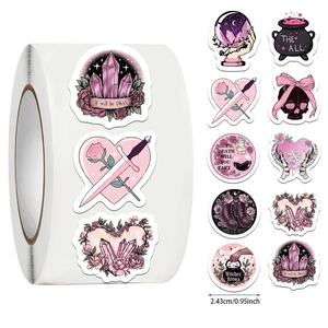 Macro view of 500 goth stickers roll featuring pink and black witchcore heart designs