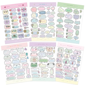 Detailed view of colorful pastel planner stickers featuring months, dates and holidays