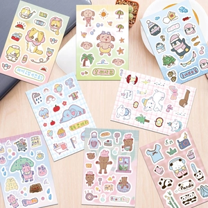 Cute waterproof cartoon animal stickers for scrapbooking and water bottles flat lay view