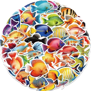 Close-up of vibrant tropical fish stickers arranged in a circle on a white background