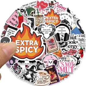 Stack of waterproof bookish stickers featuring coffee and spicy reading themes for laptop