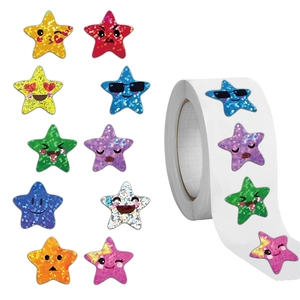 Macro view of assorted glitter star stickers with cute facial expressions on roll
