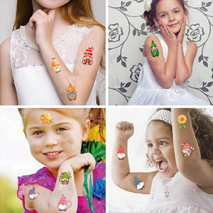 Tatuaggi temporanei di gnomi da giardino per feste di bambini con motivi floreali