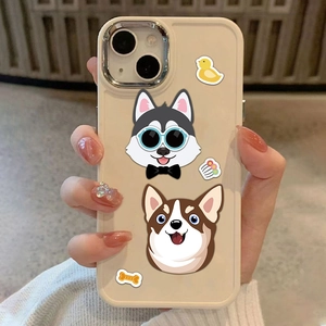Detail of cute cartoon dog stickers on a cream iPhone case held by a person