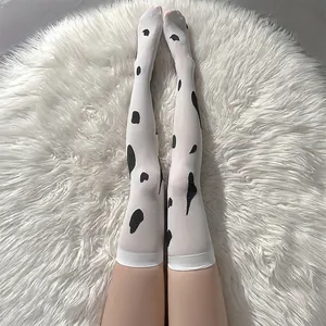 Bas au-dessus du genou imprimé vache chic en soie blanc cassé avec poignets élastiques