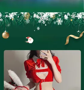 Detail view of red velvet Christmas bunny girl costume with white lace and bunny ears