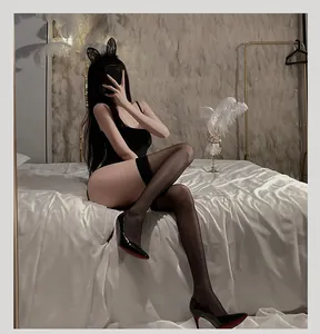 Detail view of black lace bunny girl lingerie set with sheer stockings and headband