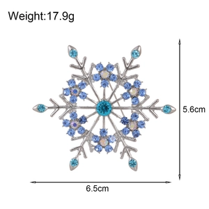 Élégante broche flocon de neige argentée avec strass bleus, taille 6,5cm x 5,6cm