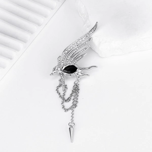 Detailed silver phoenix brooch with sparkling rhinestones and elegant hanging tassels