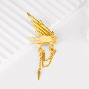 Elegant gold matte phoenix bird brooch with delicate hanging chains and cone pendants