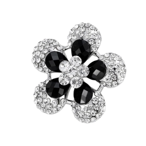 Elegant five-petal flower brooch with black gemstones and clear crystals on silver base