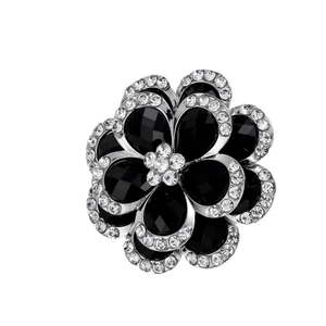 Elegant black flower brooch with silver edges and sparkling crystals for suits