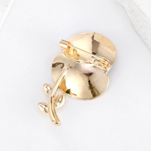 Back view of gold plated poppy flower brooch showing the secure safety pin clasp closure