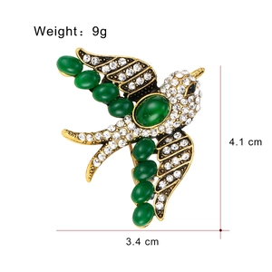 Elegant Chinese style swallow bird brooch with green gemstone and white crystals, 4.1x3.4cm