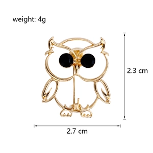 Cute minimalist owl brooch in gold finish with black gemstone eyes, size 2.3x2.7cm