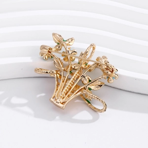 Elegant gold flower basket brooch with colorful enamel petals and classic pin back closure