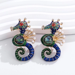 Vintage gold seahorse brooch with blue enamel, sparkling rhinestones and white pearls