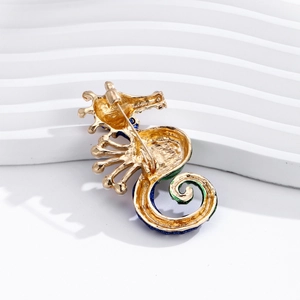 Back view of colorful seahorse brooch with gold plating and secure metal clasp pin