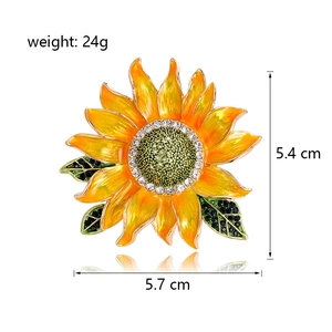 Broche tournesol étincelante avec pétales en émail jaune et strass pour costumes