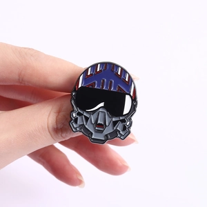 Close-up of a pilot helmet enamel pin badge with realistic detail and vibrant colors