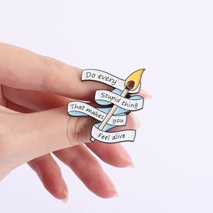 Cartoon matchstick enamel brooch with 'Do every stupid thing' quote for backpacks