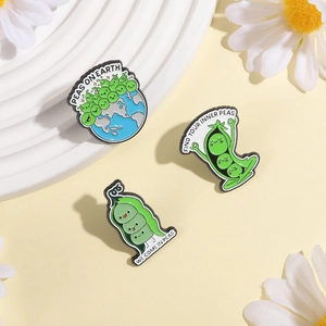 Peas on Earth creative enamel pins set featuring earth and yoga pea pod designs