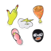 Set of five creative enamel pins featuring cartoon hand, fire, cloud, flip-flop and mask
