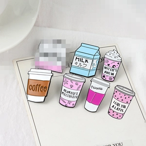 Detail showing high-quality enamel cartoon milk and coffee beverage pins on cards