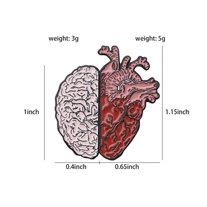 Cartoon anatomy enamel pin set featuring pink brain and red heart with dimensions labels
