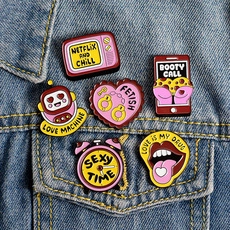 Set of 6 colorful enamel pins styled on denim jacket showing diverse trendy icons