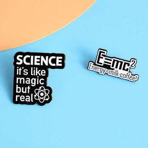 Science themed enamel pin set with Magic and Energy Milk Coffee formulas on metal badges