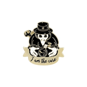 Detail of plague doctor enamel pin with I am the cure text on a white background
