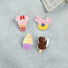 Set of 4 enamel pins featuring Mickey and Minnie mouse themed desserts on denim background