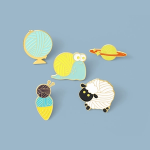Set of 5 creative enamel pins featuring yarn-themed globe, snail, and sheep designs