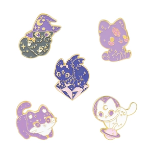 Set of five cute cartoon wizard cat enamel pins with mystical crystal and moon theme motifs