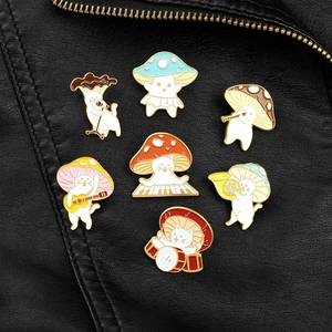 Detailed view of 7 cat mushroom pins playing musical instruments on a black jacket