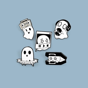 Set of five cartoon ghost enamel pins featuring music themes on a blue background
