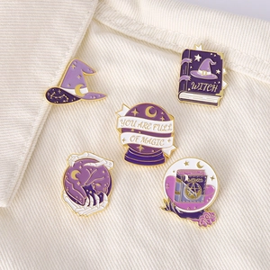5-piece purple magic enamel pin set with witch hat and wizard book badges