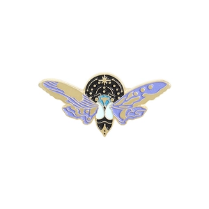 Broche papillon lumineuse en émail avec motifs célestes et ailes violettes et bleues