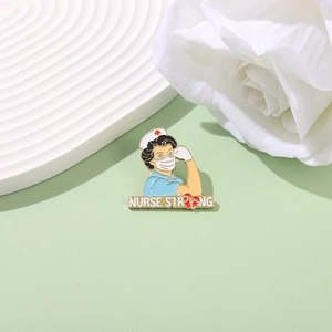 Detail view of enamel nurse strong brooch with blue background and floral accents