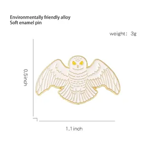 Exquisite snowy owl enamel brooch pin in eco-friendly alloy with golden metal accents