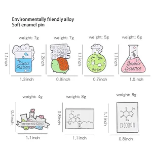 Size chart showing creative enamel science pins like flasks and chemical molecules