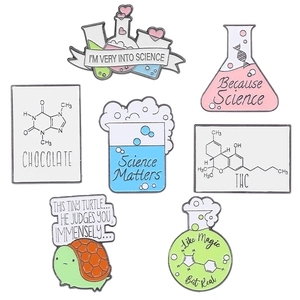 7-piece science lab enamel pin set with test tubes, molecules and cute cartoon snails