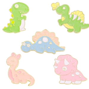 Set of 5 colorful alloy dinosaur enamel pins featuring Tyrannosaurus and Stegosaurus