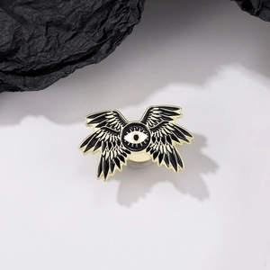 Gothic six-winged angel eye enamel brooch with black and white wings in gold alloy