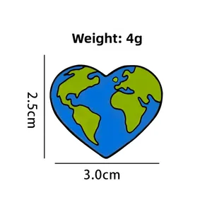 Macro shot of blue heart earth brooch showing dimensions 3.0cm width and 2.5cm height